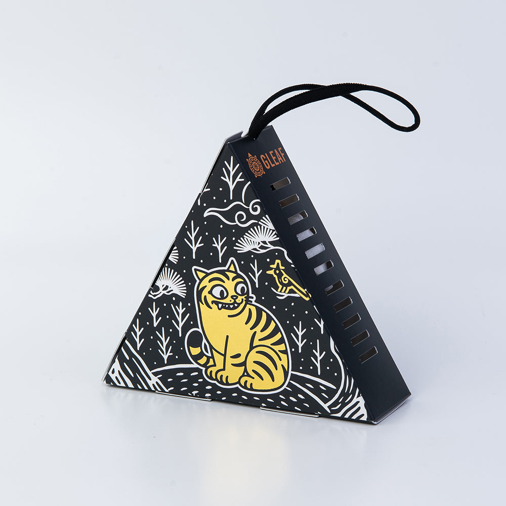 Traditional Korean tiger motif fragrance sachet in black with gold-leaf stamping – woody scent by GLEAF