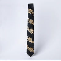 Handcrafted Korean black silk tie with gold-leaf dragon emblem by GLEAF – artisan-made luxury men’s accessory