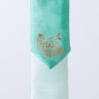 Handcrafted Korean silk keyring with gold-leaf emblem of turtle and bat by GLEAF – 100% silk handmade accessory